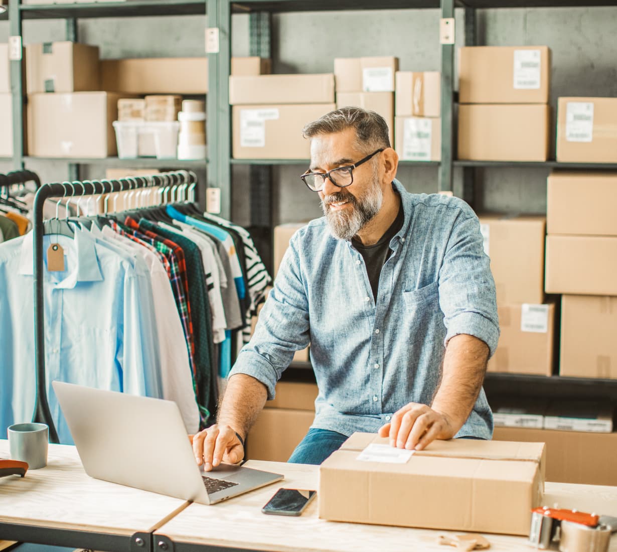 retail worker using computer to learn business line of credit blog