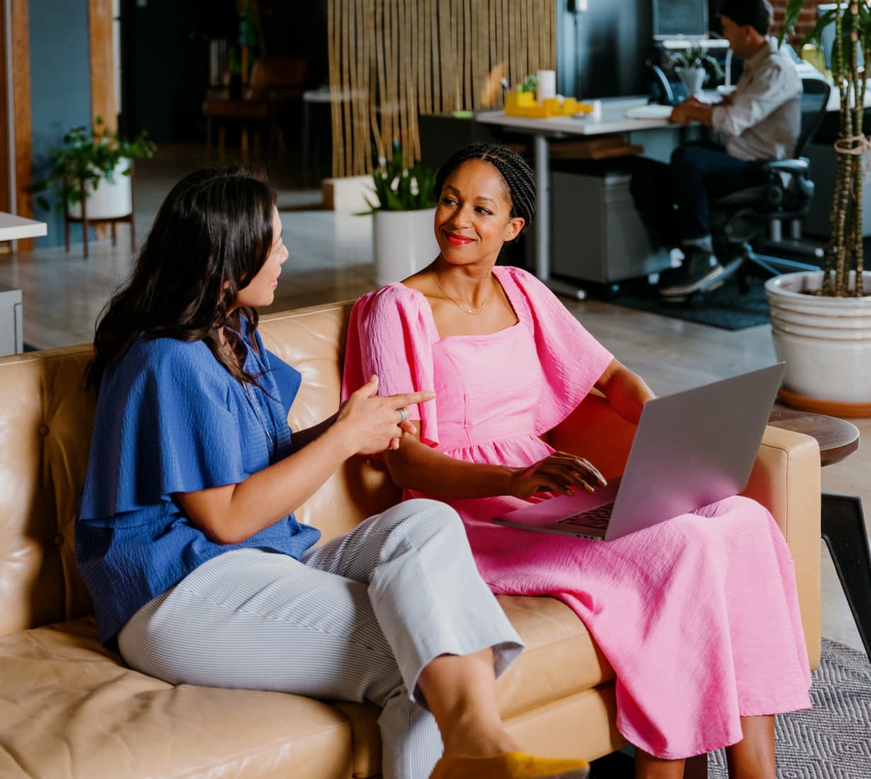 two women with laptop discussing hiring strategy blog