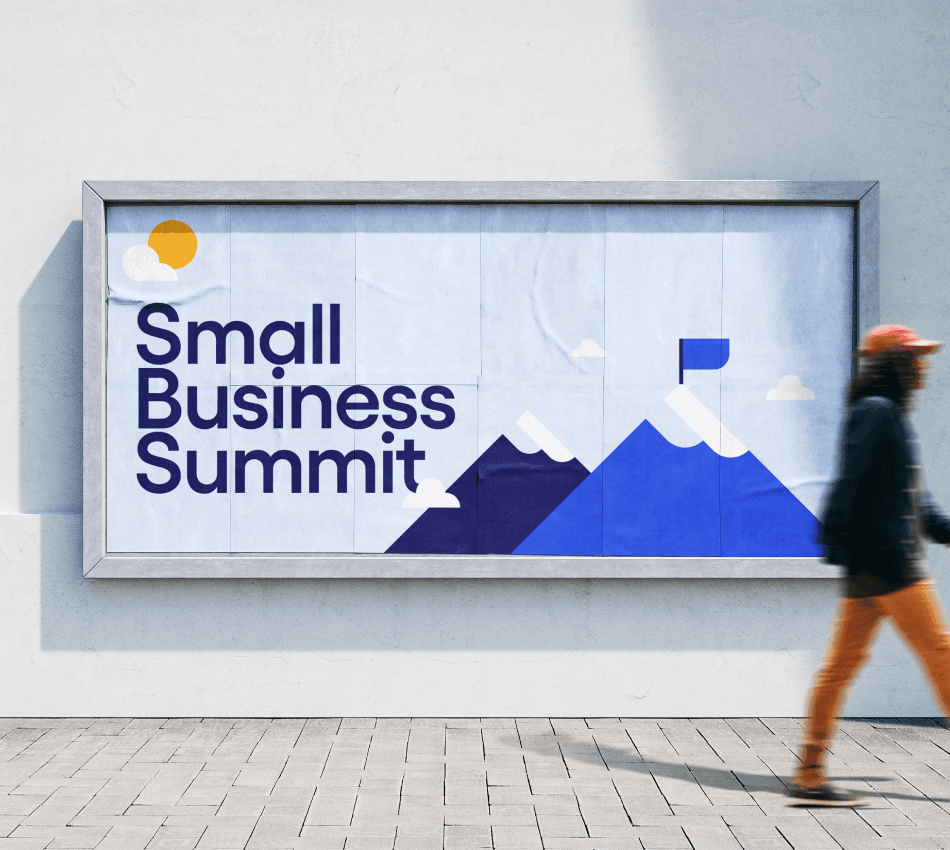 Pedestrian walks past a small billboard for an in-person marketing event.