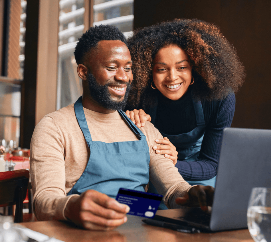 Restaurant owners make online purchase using their business credit card.
