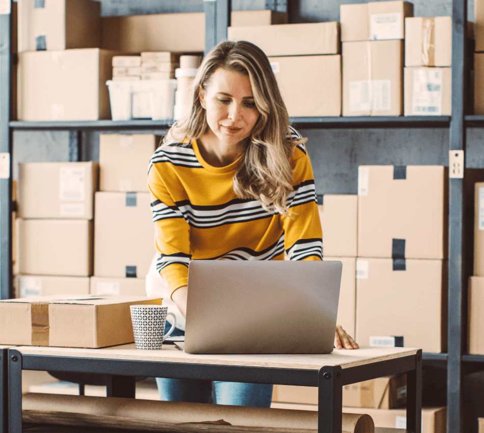 Ecommerce business owner researches best ecommerce loan options.