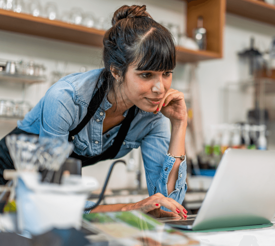 Local small business owner researches online banks vs. traditional banks